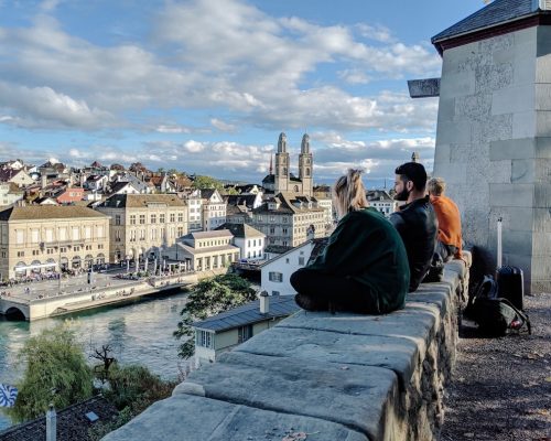 Photo taken from Lindenhof hill showing panoramic views of Zurich Old Town, the Limmat River, and Grossmünster towers, a must-see viewpoint for private city tours.