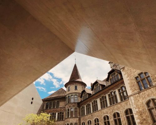 Photo of Zurich National Museum showing the contrast between historic towers and modern architectural extension, a cultural highlight for city visitors.